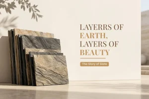 Stack of natural slate slabs in charcoal, grey and rust tones with a layered texture, leaning against a sunlit wall